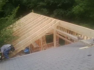 Framing a new roof addition that ties into an existing shingle roof in New Providence